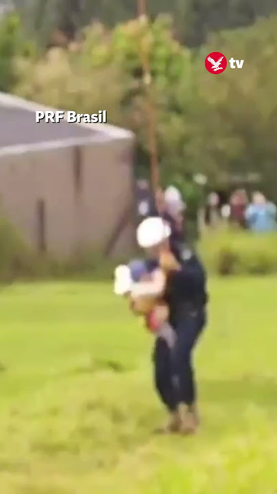Toddler rescued from roof of flooded Brazil home #shorts