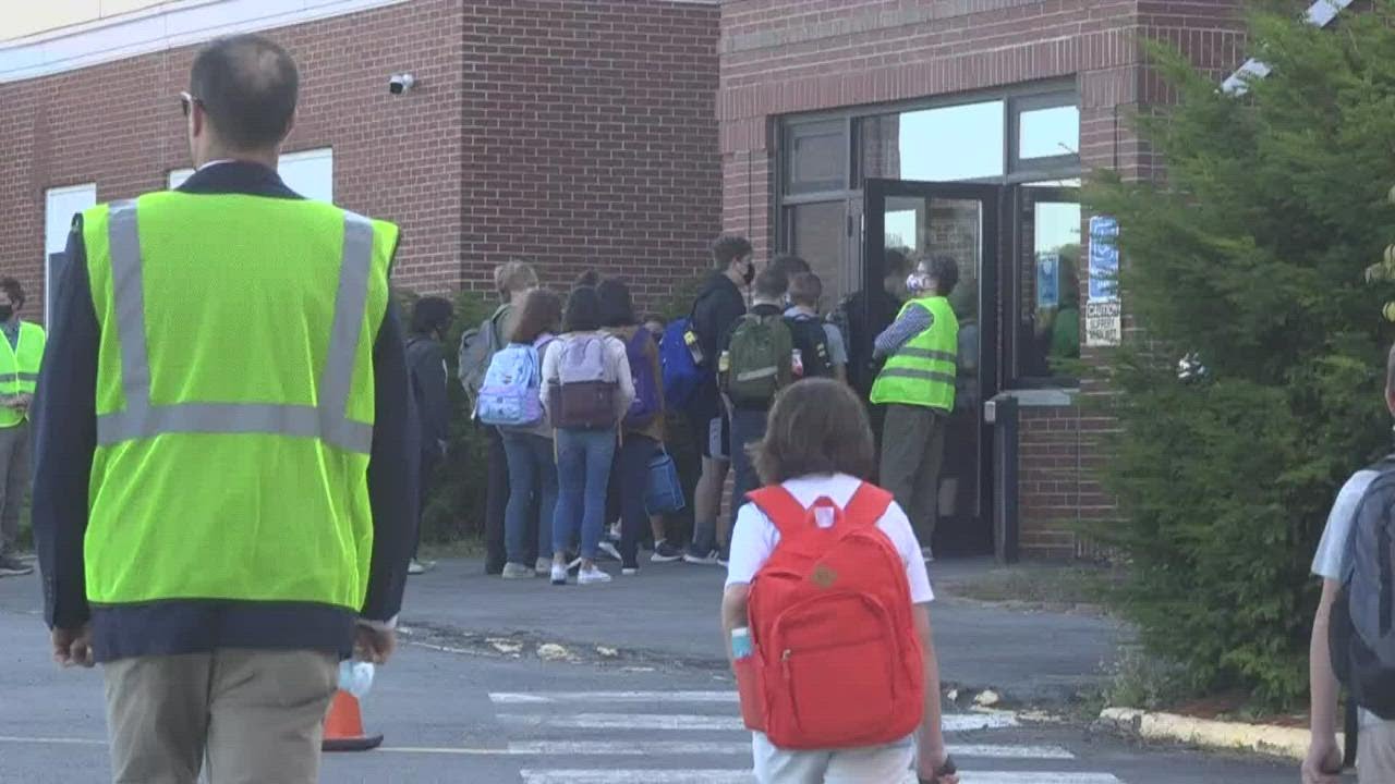 Students and teacher head back to the classrooms - YouTube
