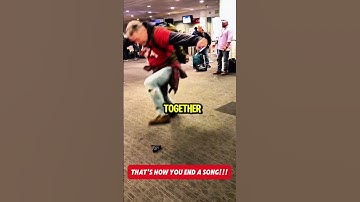 Man Creating a Scene at Seattle Airport Breaks into Song ViralHog