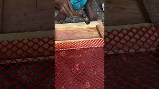 Installing Plastic Mesh On The Door Of The Pigeon House