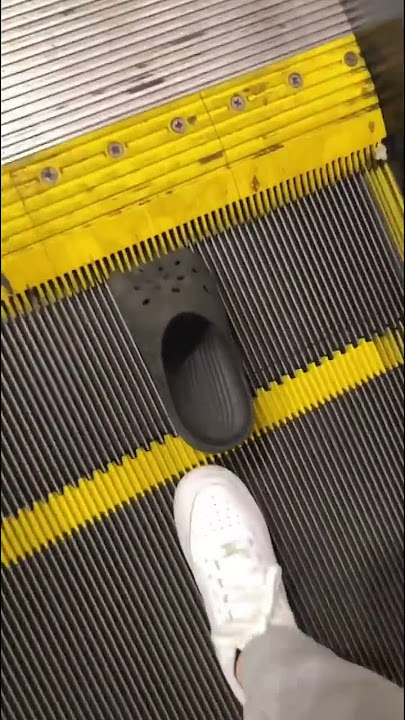 Cinderella lost her croc on Disneyland escalator..