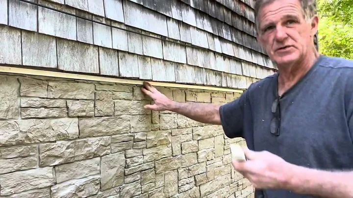Install vinyl stone siding. New Portland, Maine.