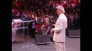 Benny Hinn bows before God (2)
