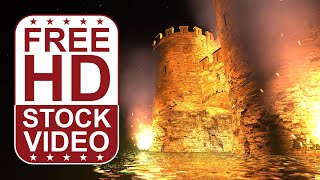 Free Stock Videos – castle tower ruins on fire with water reflections and particles at night 3D