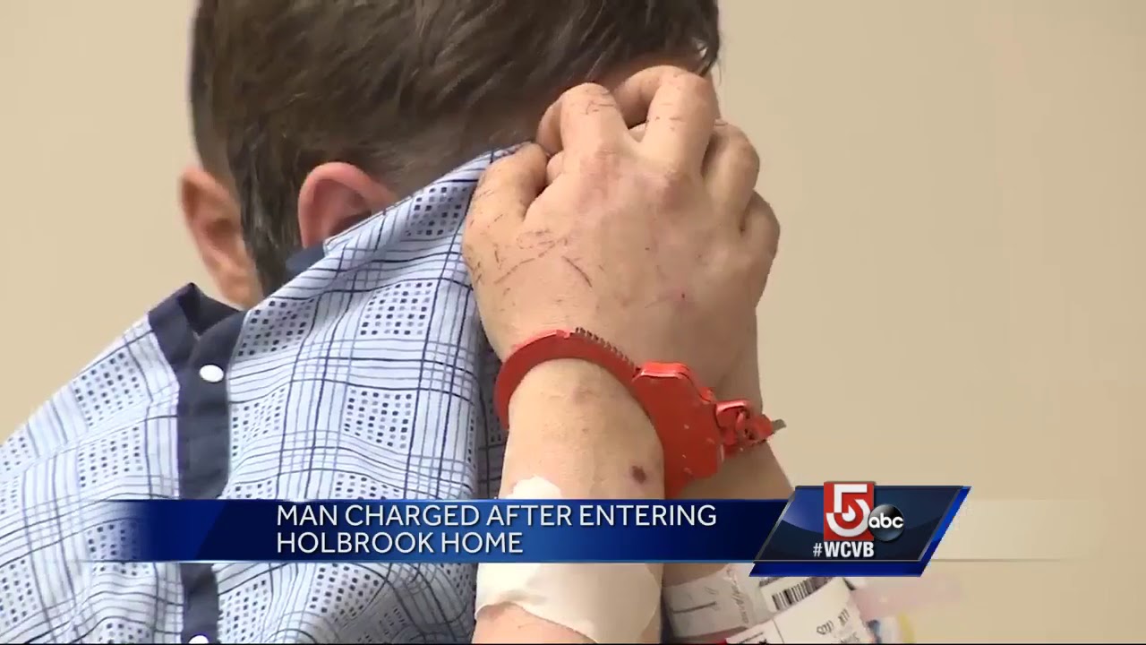 Home invasion suspect hides face in court - YouTube