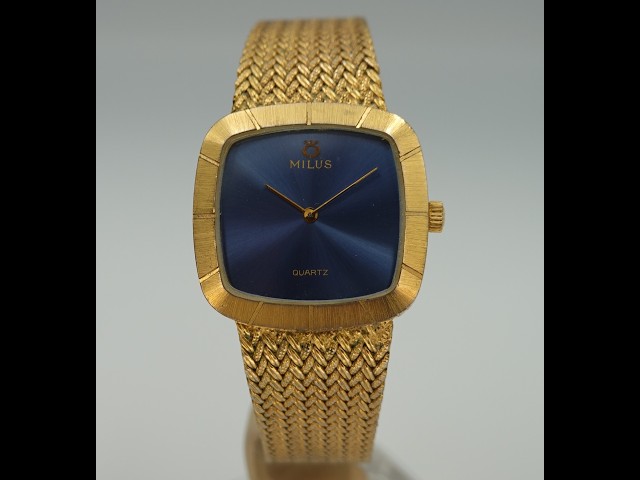 c1983 Milus men's integrated bracelet vintage watch with blue dial