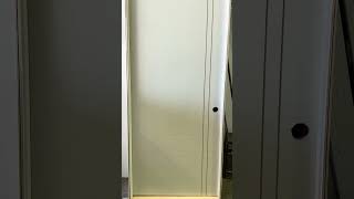 Noho - Interior Flush Primed Solid Core Door with Vertical Groove