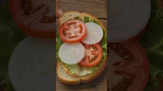 This homemade Bread Burger is loaded with a juicy patty, melted cheese, and fresh veggies