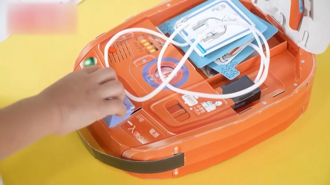 A toy AED included as a supplement to a magazine for young