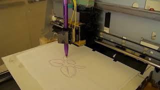 My Raspberry Pi CNC plotter drawing the raspberry pi icon
