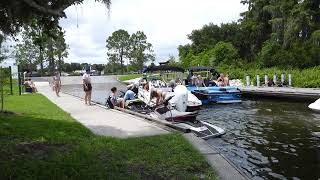 Jet ski fighting boats at the local boat ramp