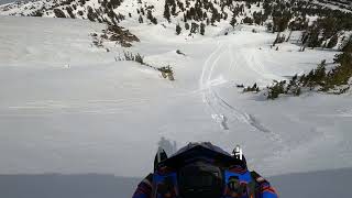Springtime Snowmobiling Cornice Drop