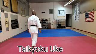 Uchi-Uke Middle Block (inside to outside)