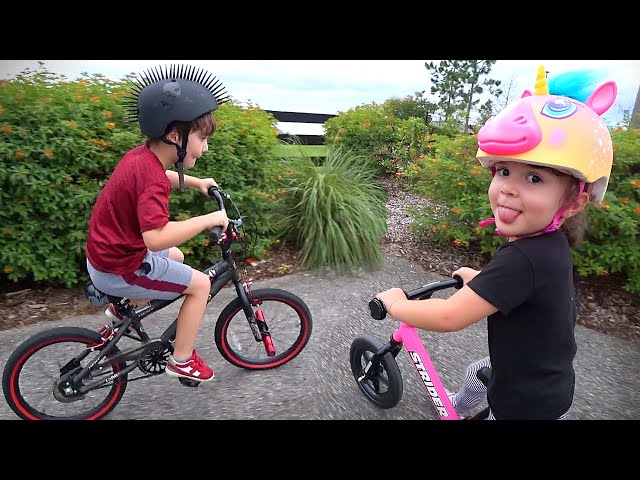 PASSEIO DE BICICLETA E CHUVA EM ORLANDO - Família Brancoala nos