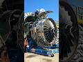 The heart of the beast exposed! 🦅💨 Watch the incredible precision it takes to remove the cowling on