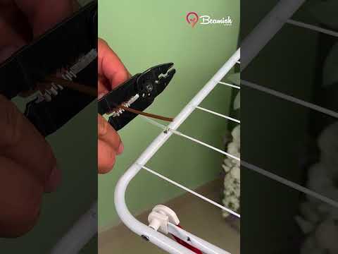 درست کردن بند رخت شکسته روی رخت آویز تعمیر لباس خشک کردن بند رخت