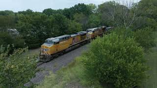 Union Pacific double stack container train makes its way through Warrensburg on the Sedalia Sub