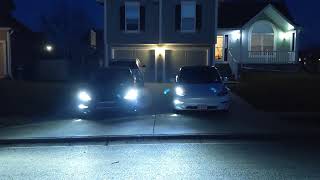 Dueling Tesla Model 3 Performances facing off in light show mode