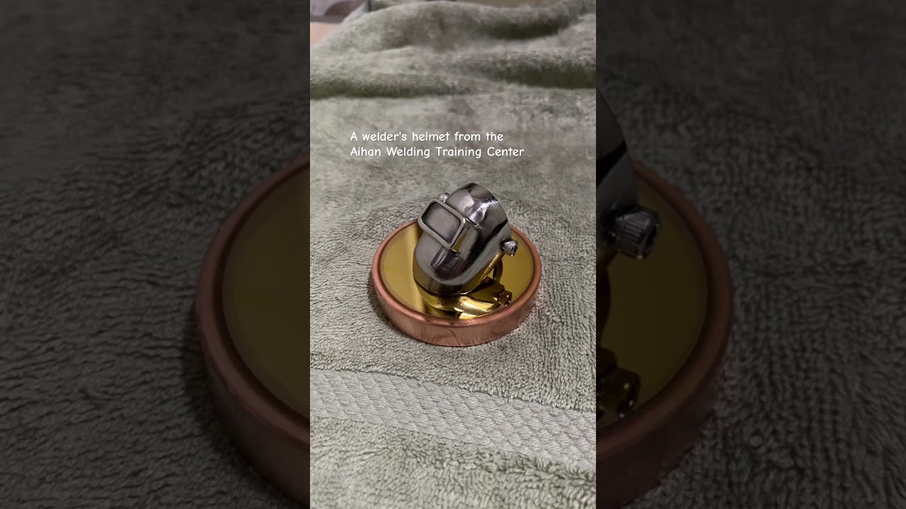 a welder's helmet from the Aihan Welding Training Center 