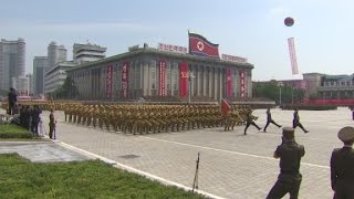 N. Korea denies hack; issues new threat