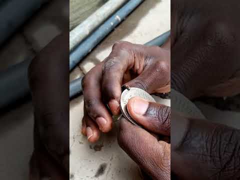 HOW TO SIDE GAP A SPARK PLUG. DONE ON A GR SALOON PEUGEOT 504