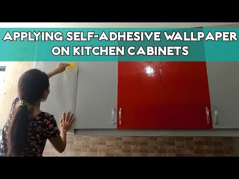 applying-glossy-self-adhesive-wallpaper-on-kitchen-cabinets