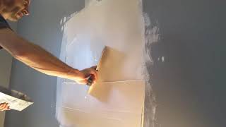 Drywall repair with wet sanding and perfectly smooth.