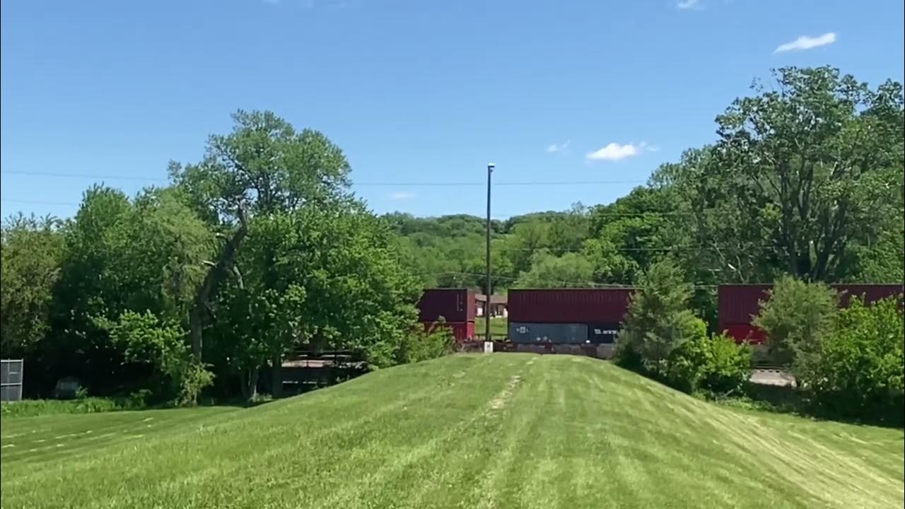 Union Pacific Container train departs Big lake park Council Bluffs Iowa