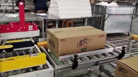Automatic robotic case packer for facial tissue paper boxes packing