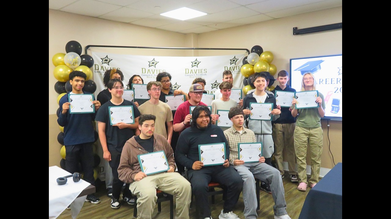 Video preview image of Davies Seniors from the Class of 2026 sign their intent to hire certificates from their employers.; click to visit the ParentSquare post with the video