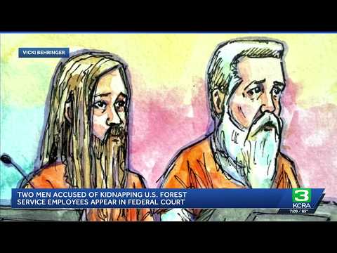 Father and son accused of kidnapping two U.S. Forest Service workers appear in federal court