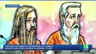 Father and son accused of kidnapping two U.S. Forest Service workers appear in federal court