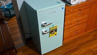I found this super cute retro mini fridge. It's awesome.