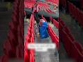 Japanese football fans clean up after themselves after Japan-England match