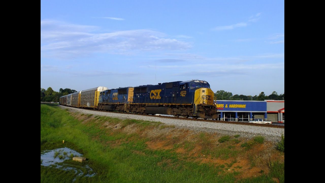 bnsf 5729 CSX Q235 with a pair of 70MAC's