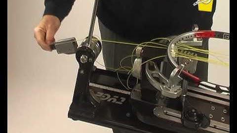 Stretch mechanism for manual stringing machine