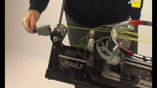 Stretch mechanism for manual stringing machine