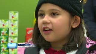 Kids shop with cop