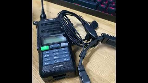 Baofeng UV-9R with Throat Mic.