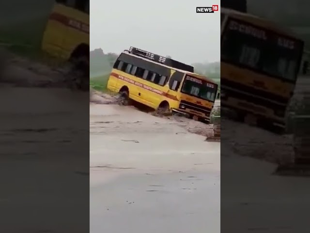 Viral Video | School Bus Swept Away on a Flooded Road in Uttarakhand | #trendingshorts #viralvideo class=