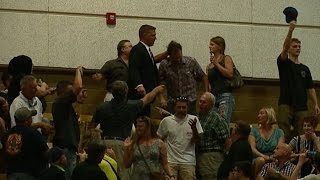 Trump Supporter Attacks Protesters