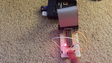 raspberry pi program that causes an led to blink when a push button is not pressed YV6p