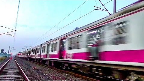 Electric Multiple Unit Train Speedy Entering Balagarh Railway Station