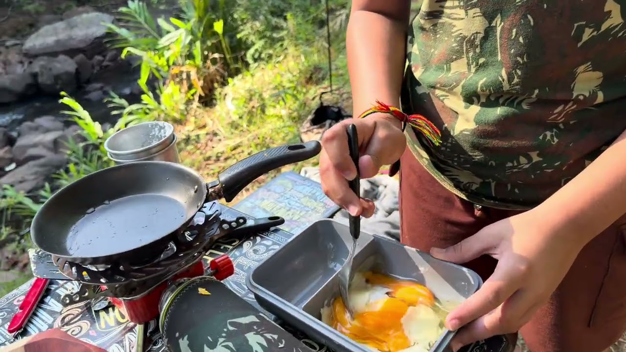 Wild camping with my daughter on a river with a waterfall