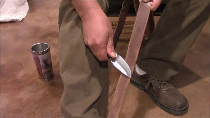 Sharpening a knife with a leather belt