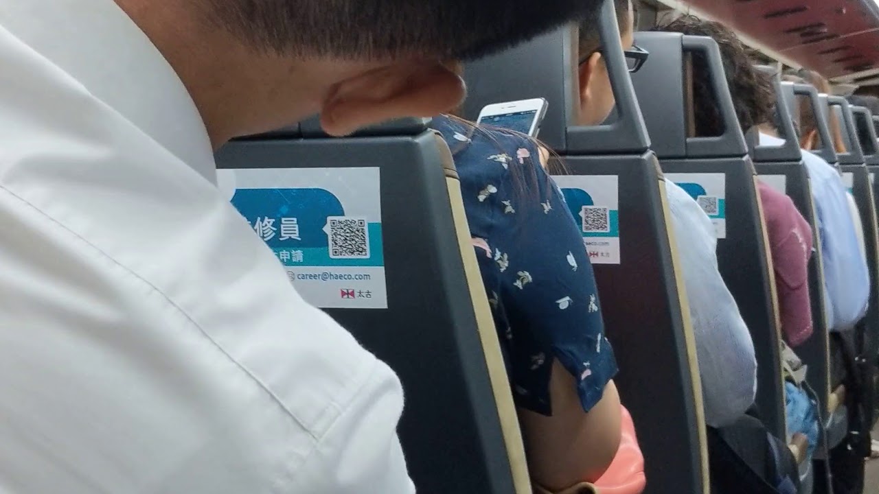 Fallen asleep in the bus during the trip in Hong Kong