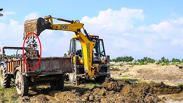 Mahindra Earthmaster Backhoe Loader Sx90 Loading Mud On Tractor for Making New House