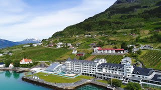 Ullensvang and spectacular waterfall Skrikjofossen  Norway 4k