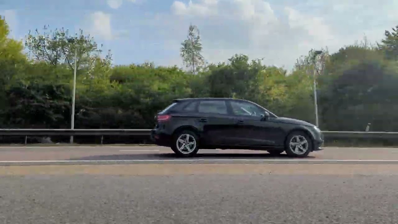 Black Car Exiting the Motorway Highway Exit Turning Royalty Free Stock Video Footage