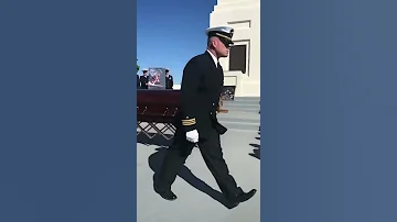 Jocko Willink pounds his SEAL Trident into Cmdr Seth Stone’s Casket